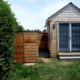 Big Man Tiny Homes – cedar clad house with outdoor shower