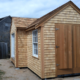 Big Man Tiny Homes – cedar shingled tiny home under construction