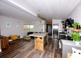 Big Man Tiny Homes – Cork, Ireland – Photo of modular home open living room kitchen