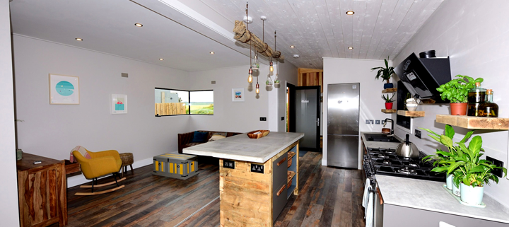 Big Man Tiny Homes – Cork, Ireland – Photo of modular home open living room kitchen